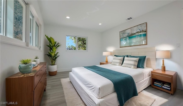 bedroom featuring light hardwood / wood-style flooring