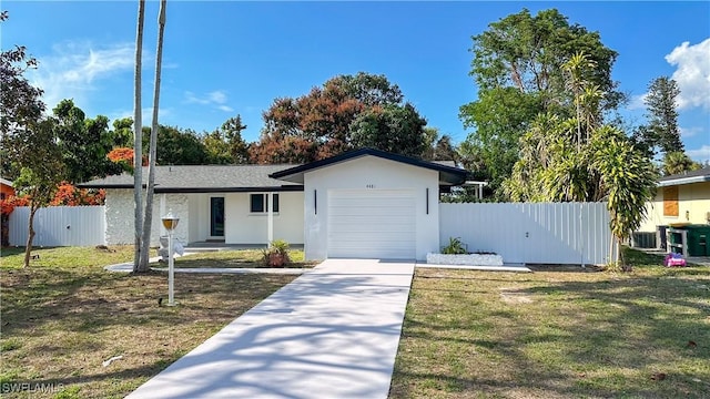 single story home with a garage, central AC unit, and a front lawn