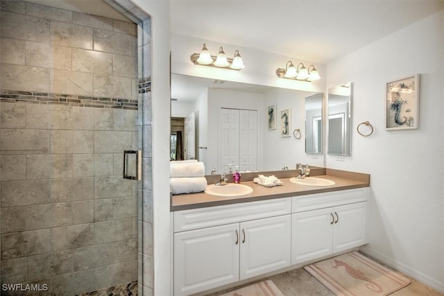 bathroom with vanity and walk in shower