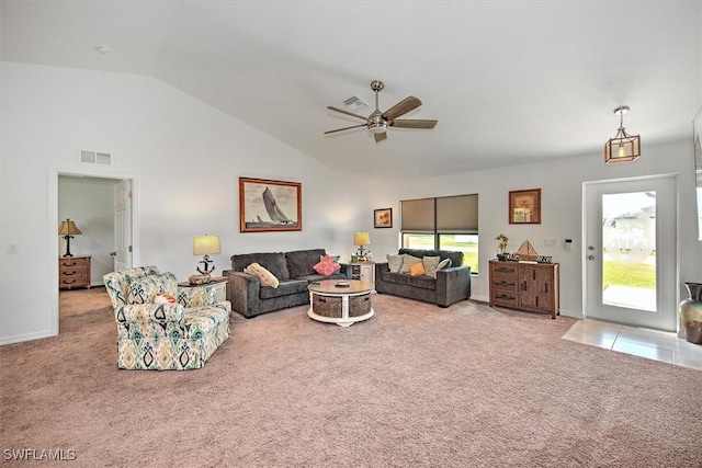 carpeted living room featuring ceiling fan and high vaulted ceiling