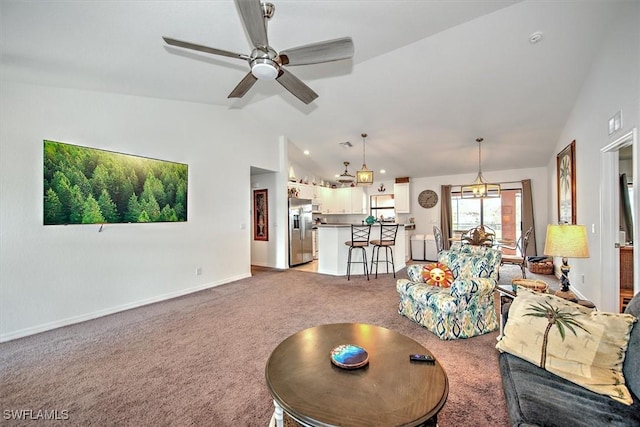 living room with lofted ceiling, light carpet, and ceiling fan