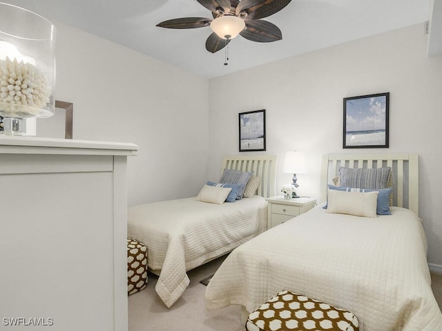 bedroom featuring ceiling fan and carpet flooring