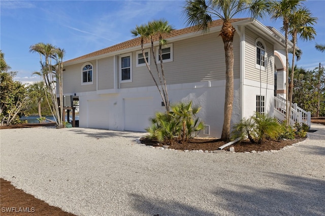 view of home's exterior with a garage