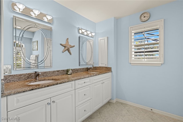 bathroom featuring vanity and tile patterned floors