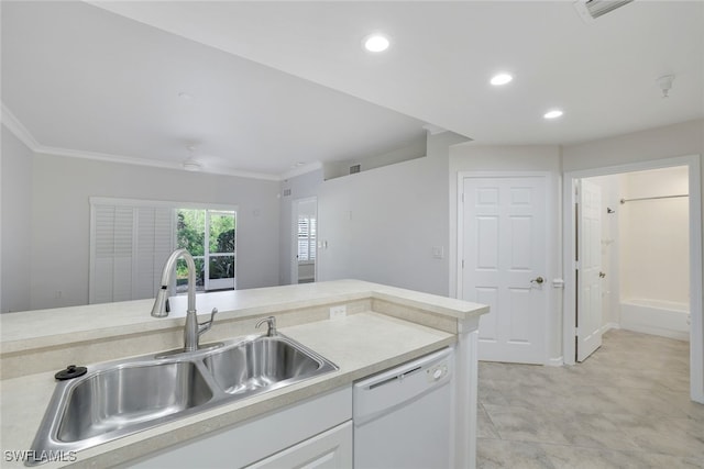 kitchen with white dishwasher, sink, crown molding, and white cabinets