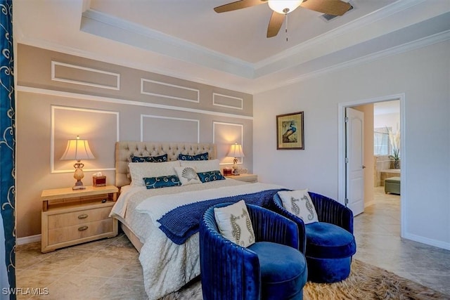 tiled bedroom featuring crown molding, ceiling fan, and a tray ceiling