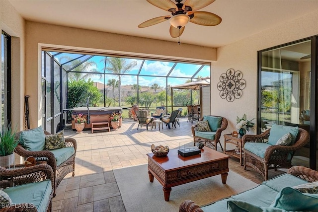 sunroom / solarium with plenty of natural light and ceiling fan