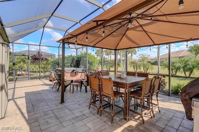 sunroom featuring lofted ceiling