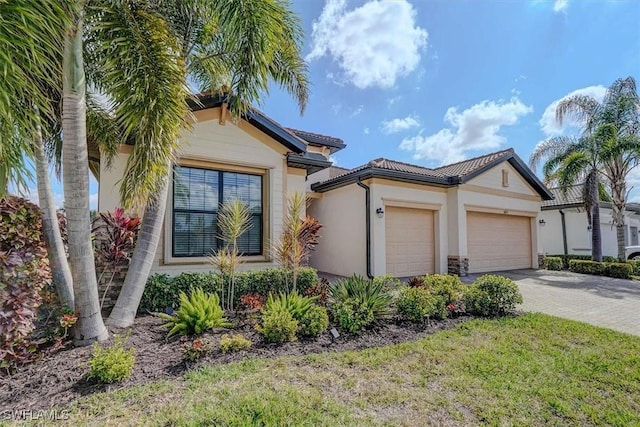 view of front of property featuring a garage