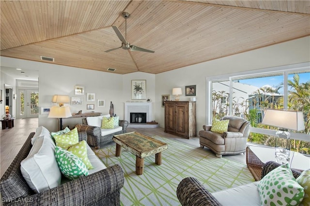 living room with vaulted ceiling, wooden ceiling, and ceiling fan