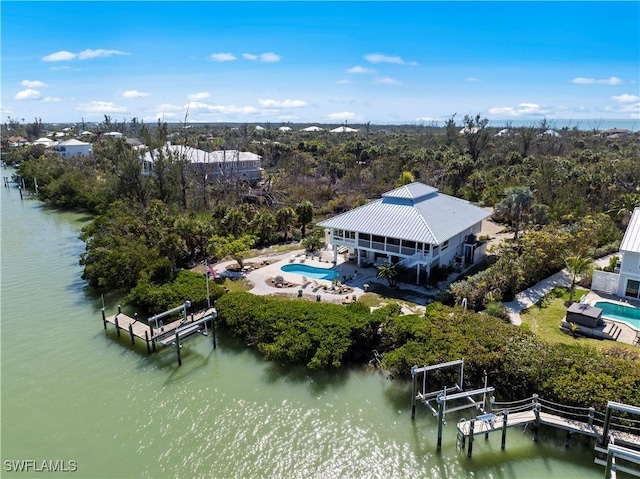 drone / aerial view featuring a water view