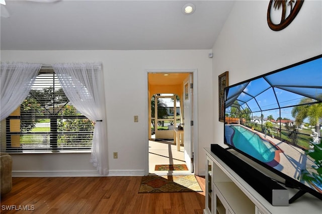 unfurnished living room with hardwood / wood-style floors