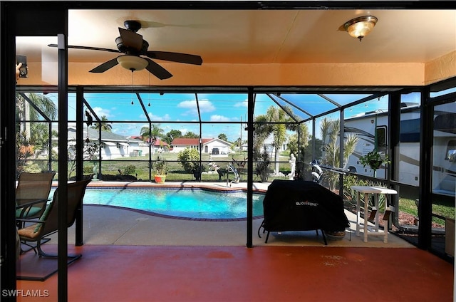 view of swimming pool featuring area for grilling