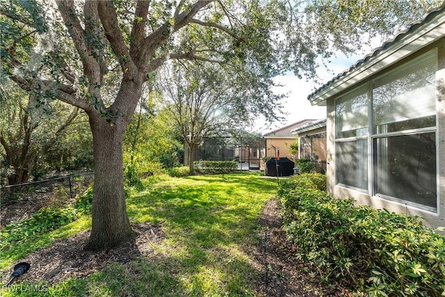 view of yard featuring fence