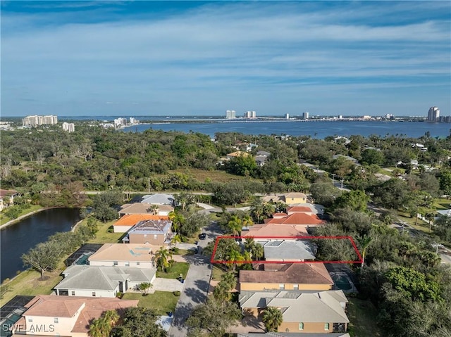 bird's eye view with a water view