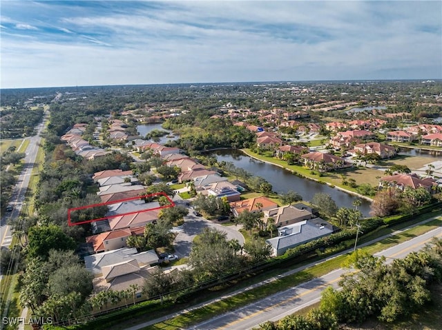 drone / aerial view with a water view