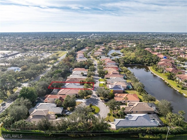 aerial view with a water view and a residential view