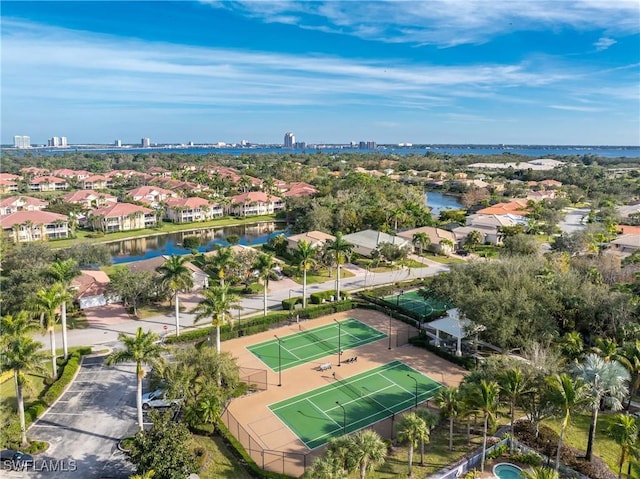 bird's eye view with a water view and a residential view