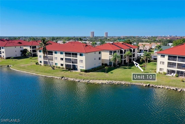 drone / aerial view with a water view