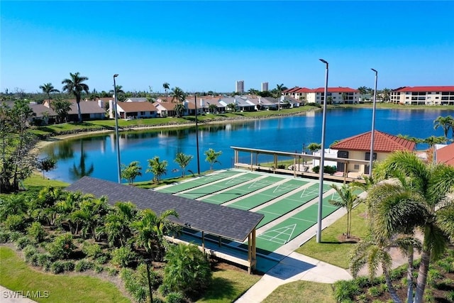 exterior space with a water view