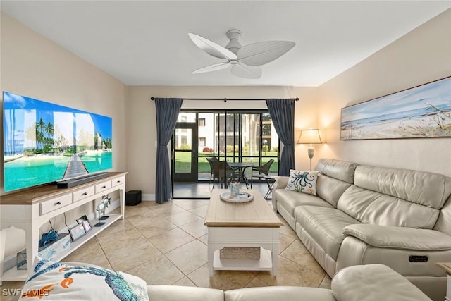 living room with light tile patterned floors and ceiling fan