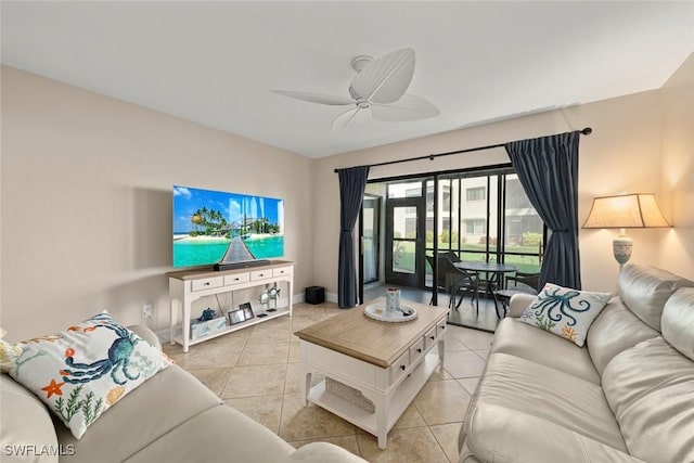 living room featuring light tile patterned flooring and ceiling fan