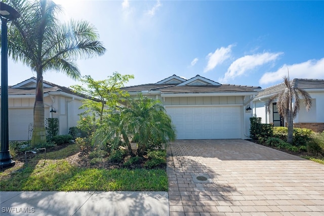 single story home with a garage