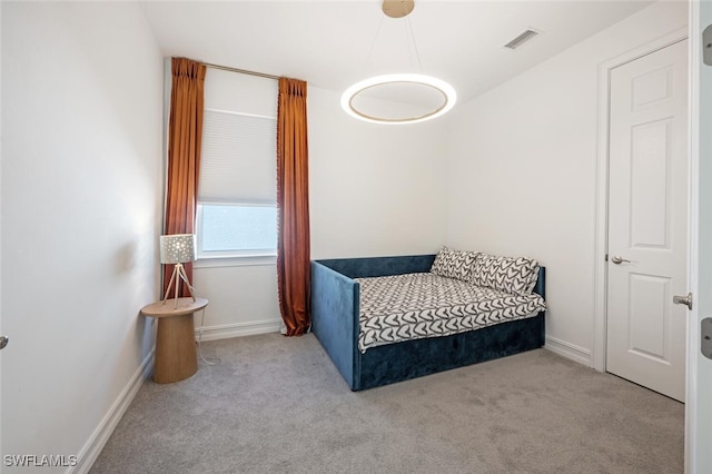 bedroom with light carpet