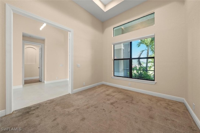 908 SW Embers Ter, Cape Coral, FL 33991 - carpeted spare room with baseboards