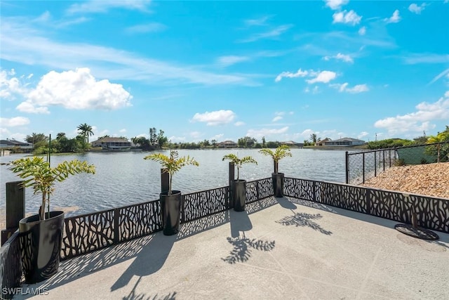 908 SW Embers Ter, Cape Coral, FL 33991 - view of patio with a water view