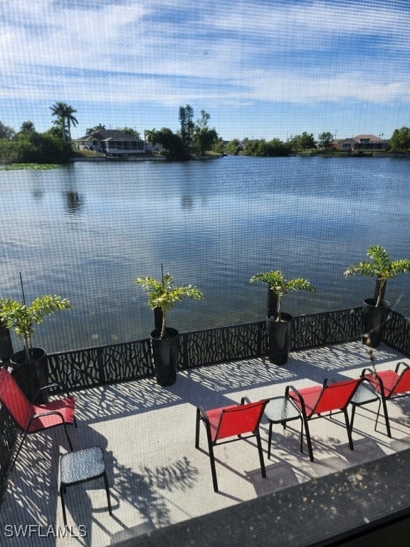 view of patio / terrace featuring a water view