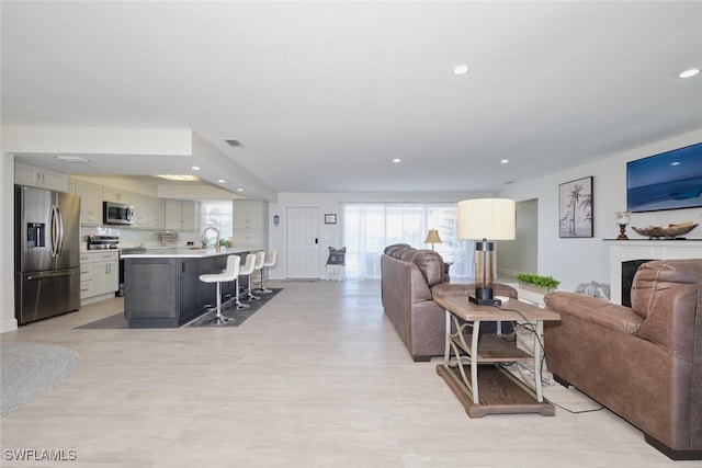 living room with sink