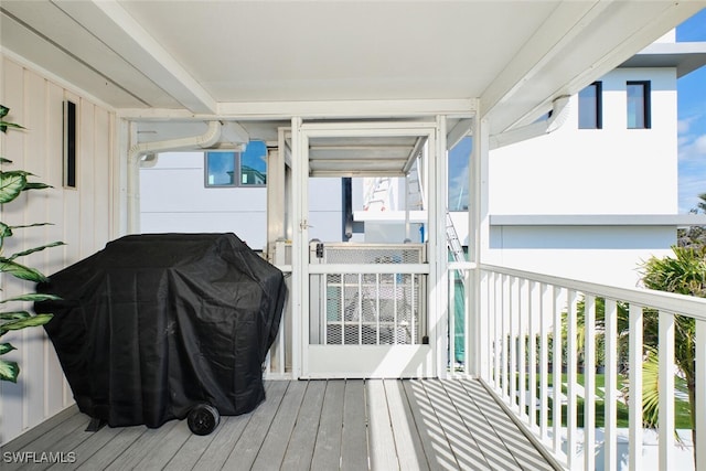 wooden terrace with grilling area