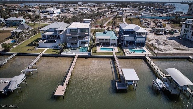 drone / aerial view featuring a water view