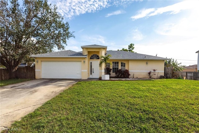 single story home with a garage and a front yard