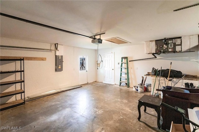 garage featuring a garage door opener and electric panel