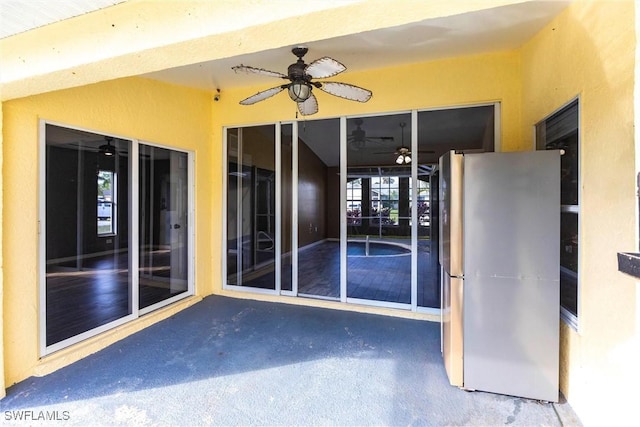 view of patio / terrace with ceiling fan