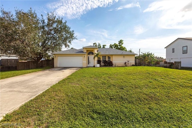 view of front of house with a garage and a front lawn