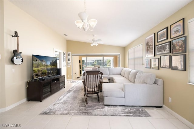 living room with light tile patterned floors, ceiling fan with notable chandelier, and vaulted ceiling