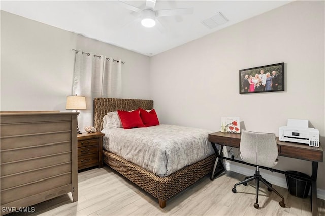 bedroom featuring ceiling fan and light wood-type flooring