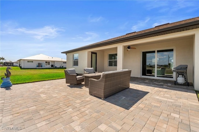 view of patio / terrace featuring ceiling fan, grilling area, and an outdoor hangout area