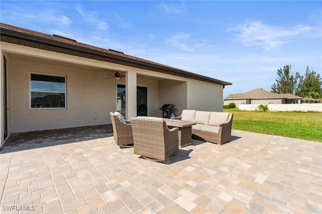 view of patio / terrace with ceiling fan, a grill, and outdoor lounge area