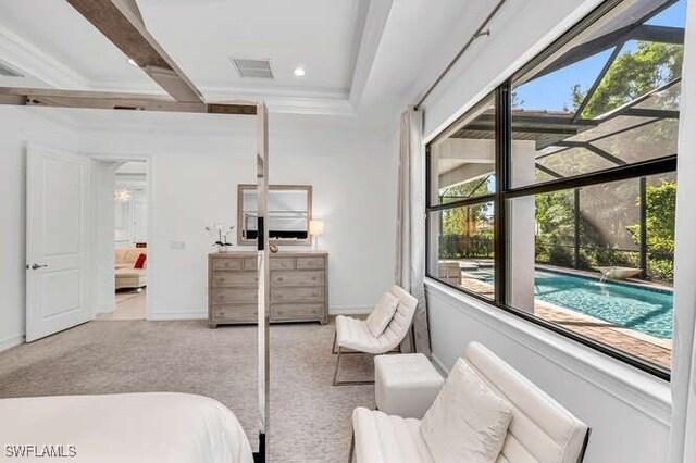 bedroom featuring crown molding and light carpet