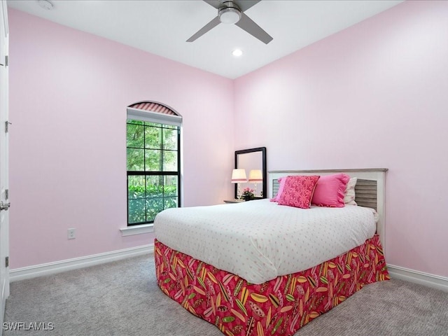 bedroom with ceiling fan and carpet floors