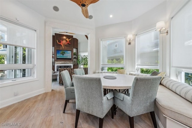 dining space featuring light wood-type flooring