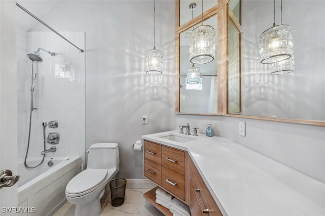 full bathroom featuring tiled shower / bath combo, vanity, and toilet