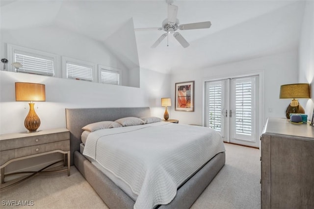 bedroom with vaulted ceiling, access to outside, light colored carpet, and ceiling fan