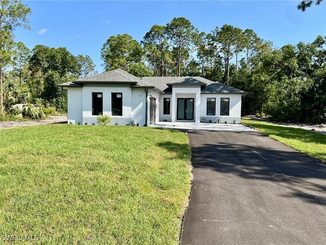 view of front of home with a front yard