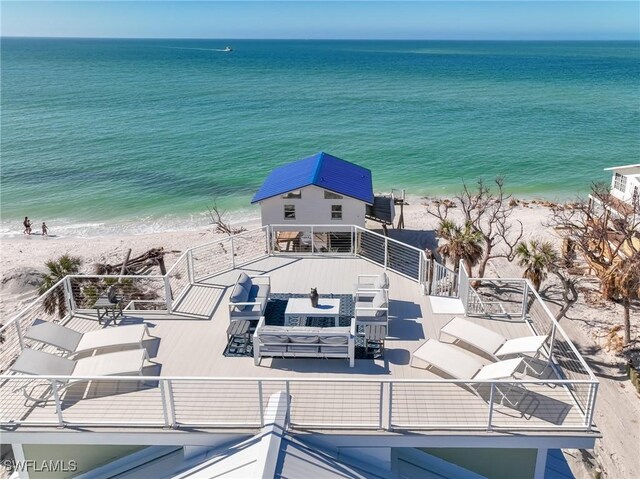 4611 Seair Ln, Upper Captiva, FL 33924 - birds eye view of property featuring a water view and a beach view