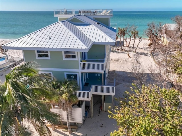 4611 Seair Ln, Upper Captiva, FL 33924 - exterior space with a water view and a beach view